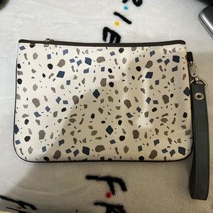 Terrazzo pebble wristlet with strap